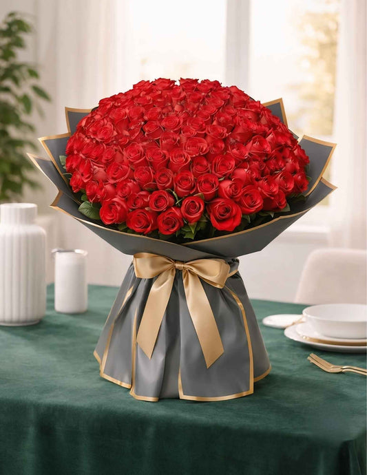Luxury bouquet of 75 premium fresh red roses with elegant black and gold wrapping by CPlants Dubai UAE 
